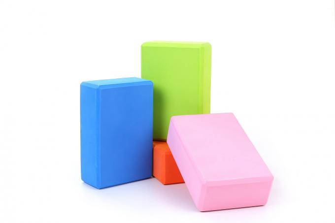 O equilíbrio e o apoio puros reciclados feitos sob encomenda da cor do bloco da ioga melhoram a força 1
